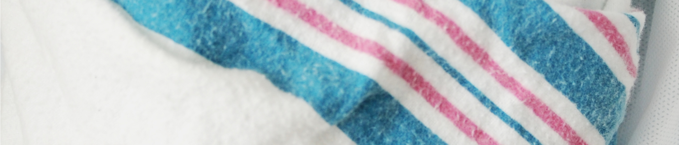 Where Did Those Pink And Blue Striped Baby Blankets Come From